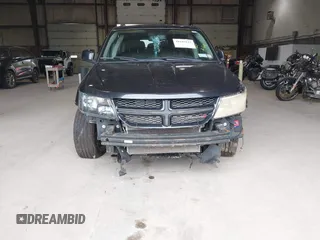 2013 Dodge Journey SXT with VIN 3C4PDDBG0DT660956, listed as a IAAI auction lot 41593385 with 196,021 mi miles and . Bid and sale history available at DreamBid. Image 6.