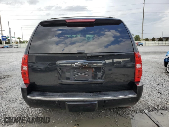 2010 Chevrolet Tahoe LTZ with VIN 1GNUKCE01AR127365, listed as a Copart auction lot 60711715 with 151,962 mi miles and Salvage title. Bid and sale history available at DreamBid. Image 6.