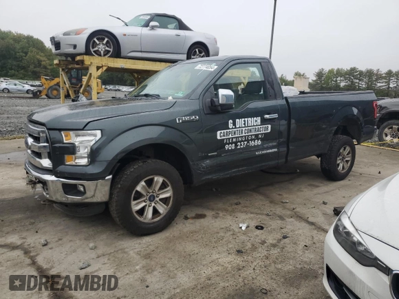 2015 Ford F-150 XL with VIN 1FTNF1EG1FKD00398, listed as a Copart auction lot 72774054 with 164,052 mi miles and Salvage title. Bid and sale history available at DreamBid. Image 1.
