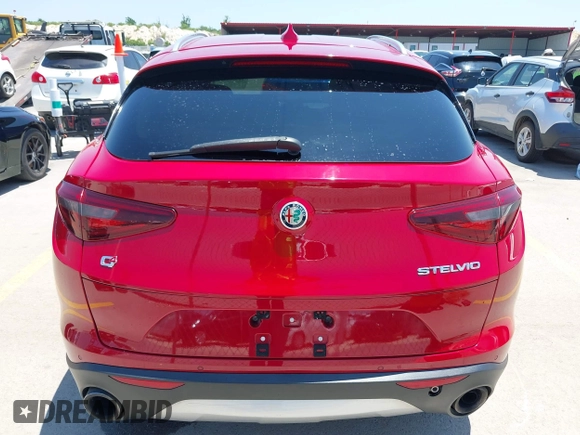2018 Alfa Romeo Stelvio z VIN ZASFAKAN8J7B64173, wystawiony jako IAAI lot #42355202 z przebiegiem 111 698 mil mil oraz . Historia ofert i sprzedaży dostępna na DreamBid. Obrazek 16.