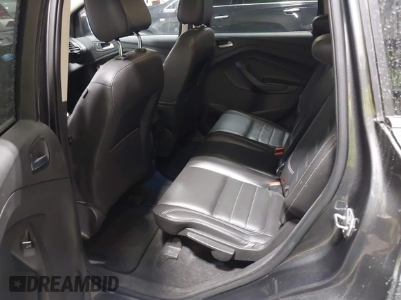 2016 Ford Escape Titanium with VIN 1FMCU9J93GUC39933, listed as a IAAI auction lot 42616323 with 116,482 mi miles and . Bid and sale history available at DreamBid. Image 8.