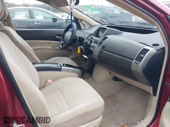 2005 Toyota Prius z VIN JTDKB20U257055663, wystawiony jako IAAI lot #41580381 z przebiegiem 123 032 mil mil oraz . Historia ofert i sprzedaży dostępna na DreamBid. Obrazek 5.