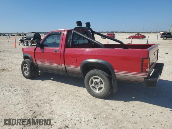 1989 Dodge Dakota z VIN 1B7GG66X6KS127702, wystawiony jako Copart lot #43276685 z przebiegiem 121 862 mil mil oraz Czysty tytuł • Clean title. Historia ofert i sprzedaży dostępna na DreamBid. Obrazek 2.