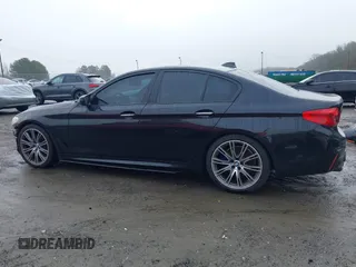 2018 BMW 5 Series M550i xDrive with VIN WBAJB9C59JB049114, listed as a IAAI auction lot 41543633 with 87,942 mi miles and . Bid and sale history available at carsss.com. Image 15.