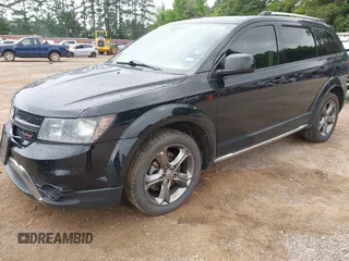 2017 Dodge Journey Crossroad Plus with VIN 3C4PDDGG1HT526083, listed as a IAAI auction lot 42357902 with 211,626 mi miles and . Bid and sale history available at DreamBid. Image 2.