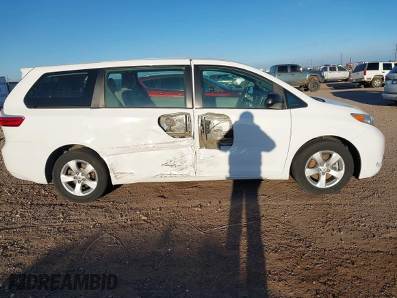 2017 Toyota Sienna L with VIN 5TDZZ3DC3HS828040, listed as a IAAI auction lot 41824384 with 76,159 mi miles. Bid and sale history available at carsss.com. Image 14.