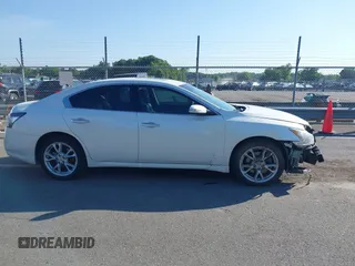 2014 Nissan Maxima S with VIN 1N4AA5AP2EC909749, listed as a IAAI auction lot 42456426 with 185,554 mi miles and . Bid and sale history available at DreamBid. Image 13.
