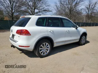 2012 Volkswagen Touareg Sport with VIN WVGEF9BP3CD011165, listed as a Copart auction lot 48913935 with 118,839 mi miles and Salvage Title. Bid and sale history available at DreamBid. Image 3.