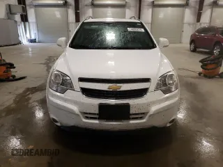 2014 Chevrolet Captiva Sport LT with VIN 3GNAL3EK4ES661268, listed as a Copart auction lot 74895224 with 128,513 mi miles and Salvage Title. Bid and sale history available at DreamBid. Image 5.
