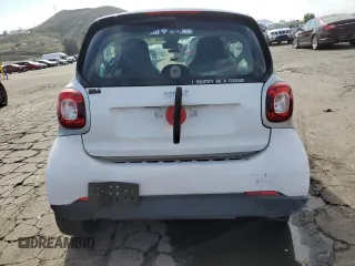 2016 Smart fortwo Passion z VIN WMEFJ5DA4GK141225, wystawiony jako Copart lot #48356965 z przebiegiem 65 928 mil mil oraz Szkody całkowita. Historia ofert i sprzedaży dostępna na DreamBid. Obrazek 6.