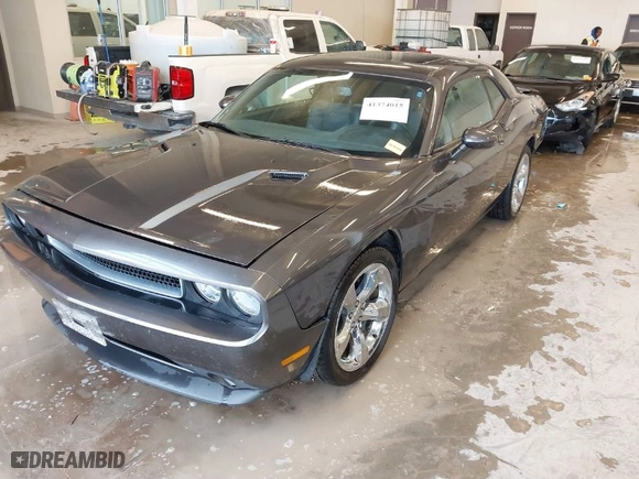 2013 Dodge Challenger SXT with VIN 2C3CDYAG9DH629189, listed as a IAAI auction lot 41374015 with 1 mi miles. Bid and sale history available at carsss.com. Image 2.
