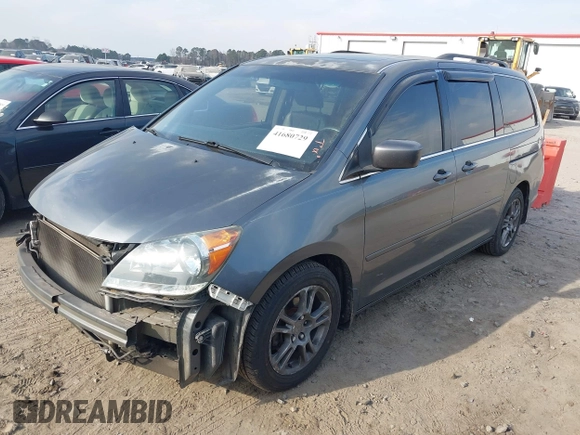 2010 Honda Odyssey EX-L with VIN 5FNRL3H7XAB099821, listed as a IAAI auction lot 41680729 with 217,458 mi miles and . Bid and sale history available at DreamBid. Image 17.
