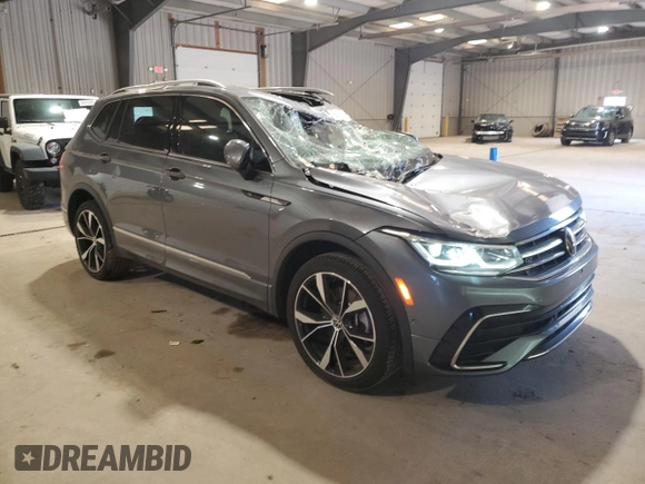 2023 Volkswagen Tiguan SEL R-Line with VIN 3VV4B7AX3PM072402, listed as a Copart auction lot 56656515 with 13,686 mi miles and Salvage title. Bid and sale history available at DreamBid. Image 4.