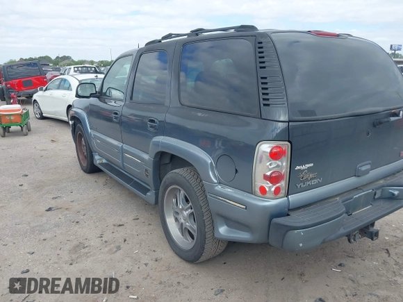 2004 GMC Yukon SLT z VIN 1GKEC13Z44J310511, wystawiony jako IAAI lot #42011475 z przebiegiem 218 746 mil mil oraz . Historia ofert i sprzedaży dostępna na DreamBid. Obrazek 3.
