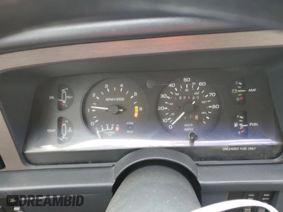 1987 Ford Thunderbird with VIN 1FABP64W7HH137025, listed as a Copart auction lot 80162264 with 137,140 mi miles and Salvage Title. Bid and sale history available at DreamBid. Image 9.