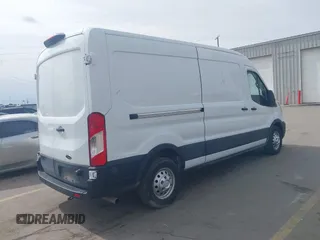 2020 Ford Transit Cargo with VIN 1FTBR2CG1LKB43034, listed as a IAAI auction lot 41668193 with 56,827 mi miles and . Bid and sale history available at DreamBid. Image 4.