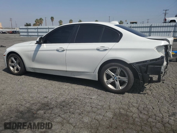 2015 BMW 3 Series 328i with VIN WBA3C1C51FP852887, listed as a Copart auction lot 58882695 with 146,823 mi miles and Salvage title. Bid and sale history available at DreamBid. Image 2.