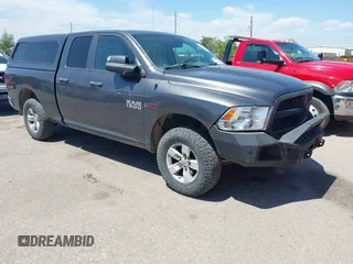 2016 Ram 1500 Tradesman z VIN 1C6RR7FMXGS409368, wystawiony jako IAAI lot #42337114 z przebiegiem 149 338 mil mil oraz . Historia ofert i sprzedaży dostępna na DreamBid. Obrazek 1.