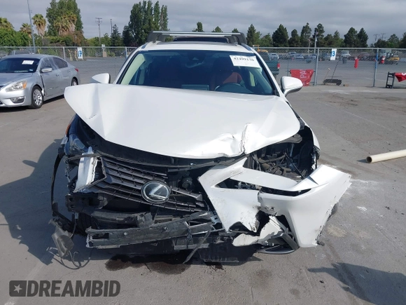 2021 Lexus NX 300 with VIN JTJGARBZXM5032858, listed as a IAAI auction lot 42499130 with 34,738 mi miles and . Bid and sale history available at DreamBid. Image 6.