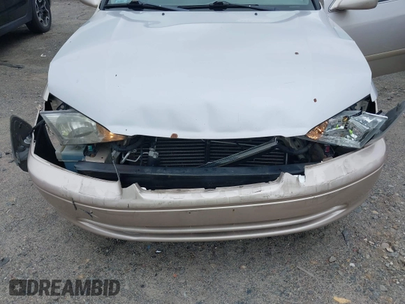 2000 Toyota Camry LE z VIN 4T1BF22K2YU094772, wystawiony jako IAAI lot #42427895 z przebiegiem 118 178 mil mil oraz . Historia ofert i sprzedaży dostępna na DreamBid. Obrazek 6.