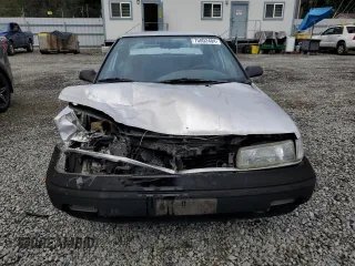 1991 Toyota Corolla z VIN 1NXAE94A8MZ234510, wystawiony jako Copart lot #75002404 z przebiegiem 188 051 mil mil oraz Szkoda całkowita • Salvage title. Historia ofert i sprzedaży dostępna na DreamBid. Obrazek 5.