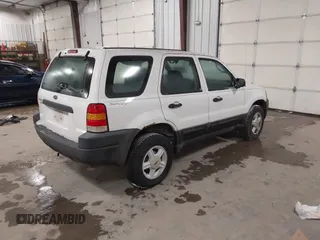 2004 Ford Escape XLS with VIN 1FMYU921X4KA88997, listed as a IAAI auction lot 41520334 with 211,761 mi miles and . Bid and sale history available at DreamBid. Image 4.