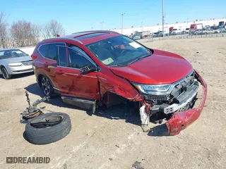 2019 Honda CR-V Touring with VIN 2HKRW1H9XKH500025, listed as a IAAI auction lot 41667564 with 73,889 mi miles. Bid and sale history available at carsss.com. Image 1.