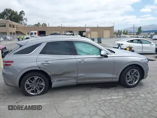 2022 Genesis GV70 2.5T with VIN KMUMADTB7NU066965, listed as a IAAI auction lot 42363654 with 25,892 mi miles and . Bid and sale history available at DreamBid. Image 14.