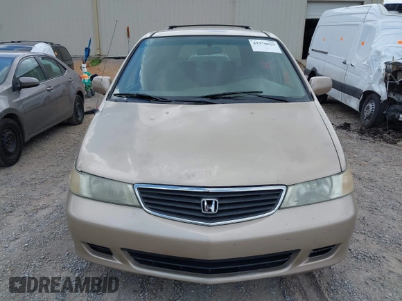 2001 Honda Odyssey EX z VIN 2HKRL18631H601677, wystawiony jako IAAI lot #42270829 z przebiegiem 205 706 mil mil oraz . Historia ofert i sprzedaży dostępna na DreamBid. Obrazek 6.