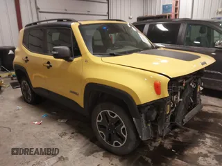 2017 Jeep Renegade Trailhawk z VIN ZACCJBCB5HPE55998, wystawiony jako IAAI lot #41096925 z przebiegiem 99 103 mil mil oraz . Historia ofert i sprzedaży dostępna na DreamBid. Obrazek 1.
