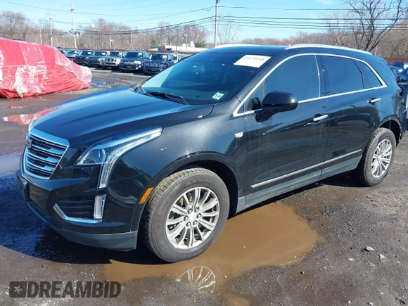 2019 Cadillac XT5 Luxury AWD with VIN 1GYKNDRS0KZ219247, listed as a IAAI auction lot 41870568 with 58,734 mi miles and . Bid and sale history available at carsss.com. Image 2.