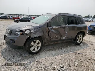 2016 Jeep Compass Sport with VIN 1C4NJDBB2GD655210, listed as a Copart auction lot 59264605 with 102,896 mi miles and Salvage title. Bid and sale history available at DreamBid. Image 1.