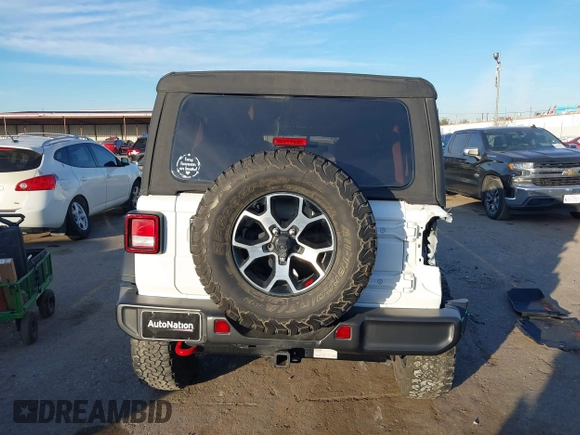 2022 Jeep Wrangler Unlimited Rubicon with VIN 1C4HJXFN4NW123803, listed as a IAAI auction lot 40994742 with 36,156 mi miles and . Bid and sale history available at DreamBid. Image 16.