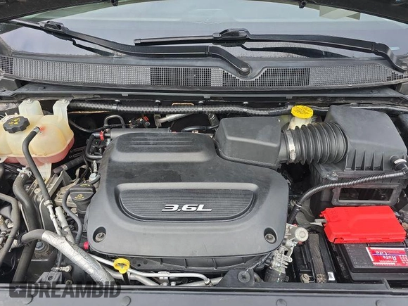 2018 Chrysler Pacifica Touring with VIN 2C4RC1DG1JR148709, listed as a IAAI auction lot 42787000 with 84,531 mi miles and . Bid and sale history available at DreamBid. Image 14.