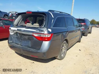 2012 Honda Odyssey EX-L with VIN 5FNRL5H64CB066240, listed as a IAAI auction lot 41792321 with 186,895 mi miles. Bid and sale history available at carsss.com. Image 4.