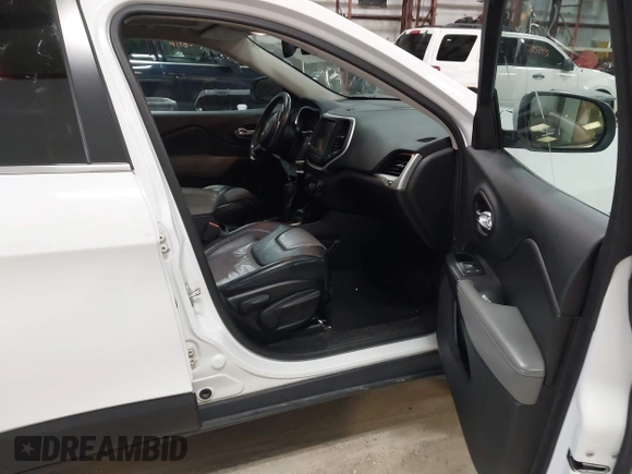 2014 Jeep Cherokee Limited with VIN 1C4PJMDS1EW235980, listed as a IAAI auction lot 41994044 with 128,292 mi miles and . Bid and sale history available at DreamBid. Image 5.