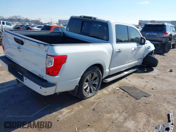 2017 Nissan Titan SL with VIN 1N6AA1E64HN565318, listed as a IAAI auction lot 41322120 with 114,515 mi miles and . Bid and sale history available at DreamBid. Image 4.