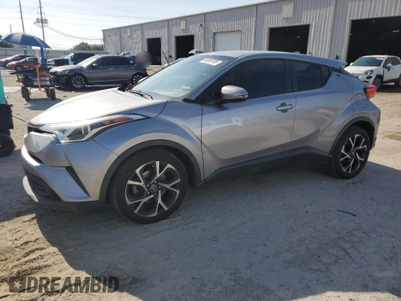 2018 Toyota C-HR XLE z VIN NMTKHMBX7JR052600, wystawiony jako Copart lot #58599785 z przebiegiem 71 144 mil mil oraz Szkoda całkowita • Salvage title. Historia ofert i sprzedaży dostępna na DreamBid. Obrazek 1.