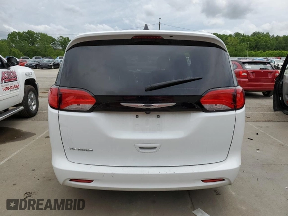 2023 Chrysler Voyager LX z VIN 2C4RC1CG0PR601874, wystawiony jako Copart lot #56747115 z przebiegiem 51 210 mil mil oraz Nie do naprawy. Historia ofert i sprzedaży dostępna na DreamBid. Obrazek 6.