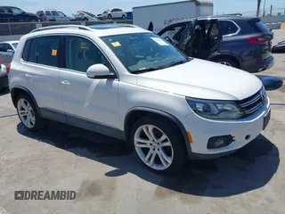 2013 Volkswagen Tiguan S with VIN WVGBV3AX0DW060270, listed as a IAAI auction lot 42703723 with 96,922 mi miles and . Bid and sale history available at DreamBid. Image 1.