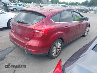 2015 Ford Focus Titanium с VIN 1FADP3N24FL217315, выставлен на аукционе IAAI как лот 42750736 с пробегом 129 868 миль миль и . История ставок и продаж доступна на DreamBid. Изображение 4.