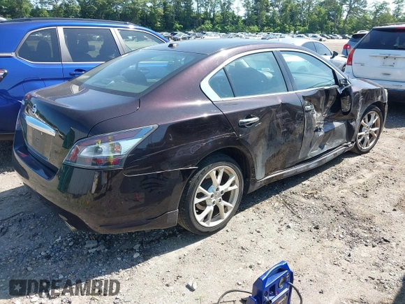 2014 Nissan Maxima S with VIN 1N4AA5AP5EC480297, listed as a IAAI auction lot 42572233 with 79,101 mi miles and . Bid and sale history available at DreamBid. Image 4.