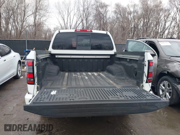 2022 Nissan Frontier SV z VIN 1N6ED1EJ2NN646035, wystawiony jako IAAI lot #41702459 z przebiegiem 93 030 mil mil oraz . Historia ofert i sprzedaży dostępna na DreamBid. Obrazek 12.