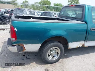 1997 Ford F-150 with VIN 1FTDF1722VNB40056, listed as a IAAI auction lot 42502044 with 155,836 mi miles and . Bid and sale history available at DreamBid. Image 12.