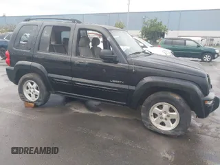 2004 Jeep Liberty Limited with VIN 1J4GL58K94W318379, listed as a IAAI auction lot 41802645 with 275,834 mi miles. Bid and sale history available at carsss.com. Image 1.