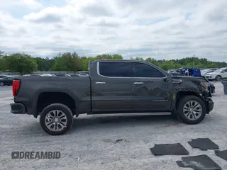 2019 GMC Sierra 1500 Denali z VIN 1GTU9FEL8KZ180128, wystawiony jako IAAI lot #42028488 z przebiegiem 78 015 mil mil oraz . Historia ofert i sprzedaży dostępna na DreamBid. Obrazek 13.