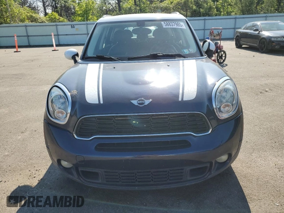 2013 MINI Countryman S with VIN WMWZC3C56DWP23892, listed as a Copart auction lot 58837985 with 98,988 mi miles and Clean title. Bid and sale history available at DreamBid. Image 5.
