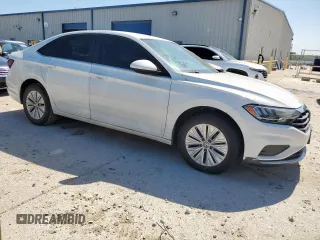 2019 Volkswagen Jetta S with VIN 3VWC57BU7KM064315, listed as a Copart auction lot 57457975 with 129,596 mi miles and Salvage title. Bid and sale history available at DreamBid. Image 4.
