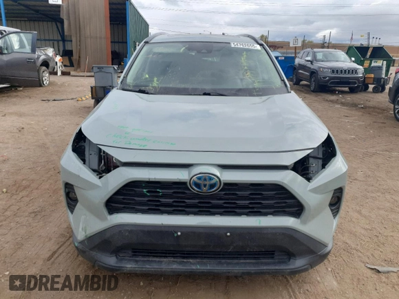 2020 Toyota RAV4 Hybrid XLE with VIN 2T3RWRFV2LW057300, listed as a Copart auction lot 54762655 with 96,624 mi miles and Salvage title. Bid and sale history available at DreamBid. Image 5.