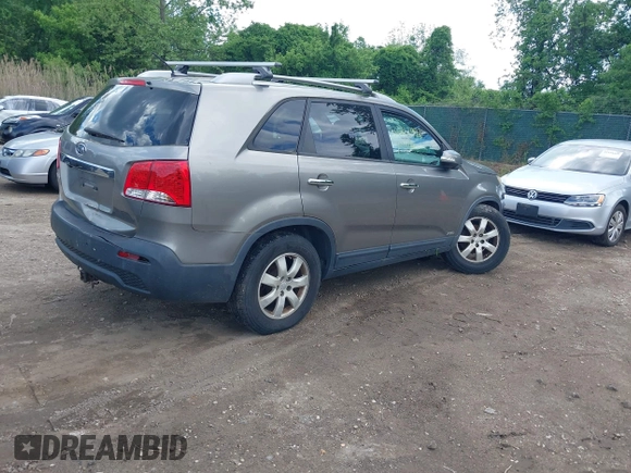 2011 Kia Sorento LX with VIN 5XYKTCA14BG056447, listed as a IAAI auction lot 42212972 with 207,258 mi miles. Bid and sale history available at carsss.com. Image 4.